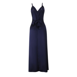 Detail view of dark blue satin slip dress featuring a large decorative back bow tie