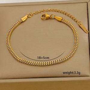 Detailed view of dual-row square chain bracelet in 18K gold finish with size tag