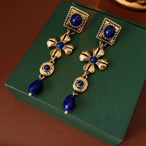 Vintage floral drop earrings in gold with deep blue lapis-style faceted gemstones