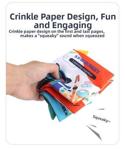 Detail of soft baby cloth book showing crinkle sound feature for sensory early learning