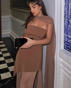 Close-up of brown tube top dress with long matching shawl and elegant draped fabric