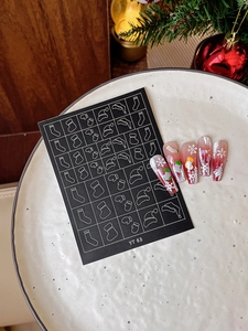 Detailed Christmas nail stickers with festive deer, trees and snowflakes patterns