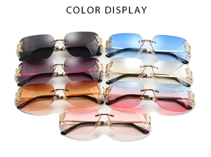 Detailed color display of rimless butterfly sunglasses with crystal metal hinges
