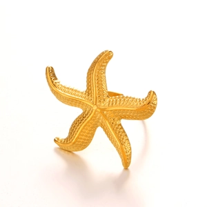 Golden starfish open ring with textured surface in ocean-inspired minimalist style