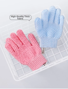 Detailed macro view of pink and blue exfoliating bath gloves with textured knit fabric