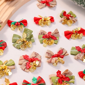 Christmas burlap bows with gold bells and red berries for tree decoration and ornaments