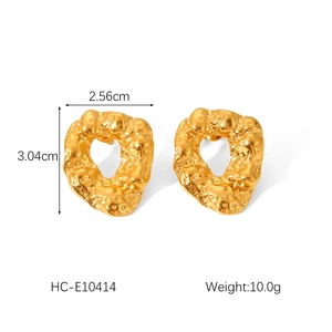 Detailed view of golden irregular earrings with precise size and weight measurements