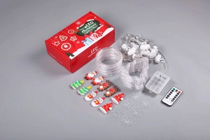 LED Christmas light set with remote, battery box and festive charms on grey background