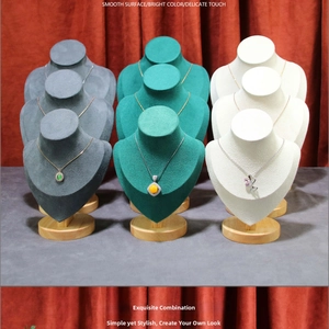 Three-color flocked necklace display busts with circular wooden bases for jewelry storage