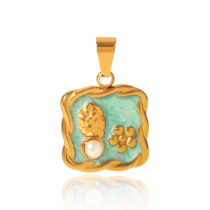 Macro shot of gold square pendant with turquoise enamel, floral relief, and pearl center