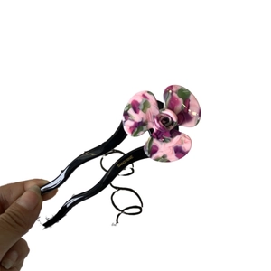 Elegant 3D acetate flower hair stick with curved black pin for vintage bun styling