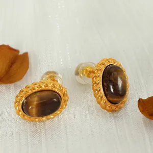 Vintage gold oval tiger eye stud earrings with twisted rope texture and silicone backs