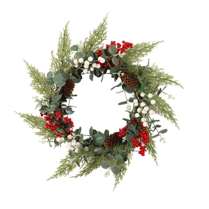 Christmas wreath with green pine needles, eucalyptus leaves, pine cones and red berries
