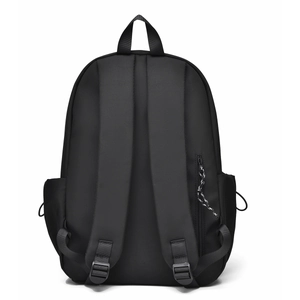 Minimalist black nylon backpack showing padded shoulder straps and back view in studio