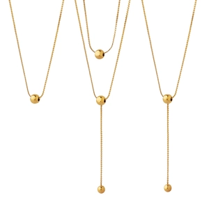 Three gold minimalist double-layer beaded necklaces with long tassel pendant for women