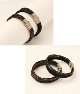 Detail view of woven leather bracelet with polished stainless steel clasp and eco-friendly finish