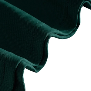 Detail macro shot of dark green piqué polo shirt fabric showing breathable mesh texture