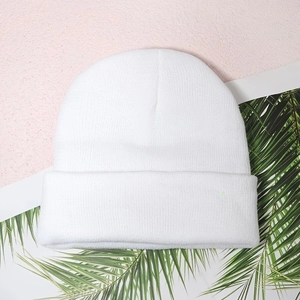 Classic white ribbed knit beanie with Brooklyn 1898 embroidery for winter warmth