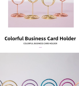 Close-up of colorful metal heart-shaped photo holders with spiral base in various plating colors