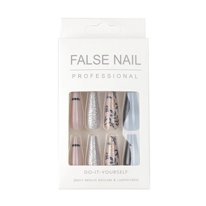 Pale pink 24pcs long ballet press-on nails set with glitter and black leaf patterns