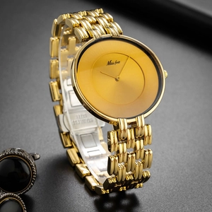 Elegant gold vintage round dial watch with minimalist stainless steel link bracelet