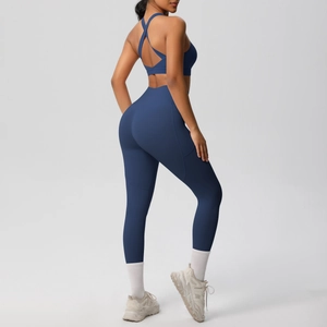 Detail view of high-waist yoga set with racerback sports bra and lifting leggings