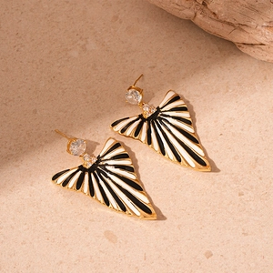 Vintage gold earrings with black and white striped enamel and sparkling zircon accents