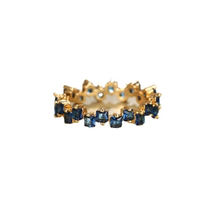 Luxurious gold-plated ring with offset blue square zircon stones in a vintage style
