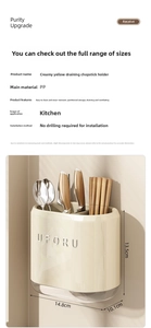 Detail view of cream kitchen cutlery holder with drainage base and partitioned storage