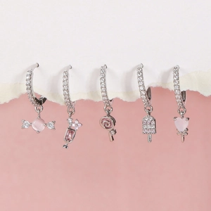 Detailed set of pink zircon earrings featuring candy, cocktail, and ice cream charms