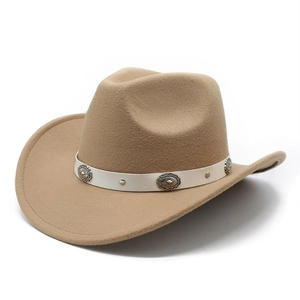 Detail of western cowboy hat with white leather band and vintage silver buckles