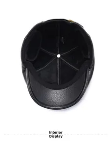 Detail of the warm black fleece lining and foldaway ear flaps inside the leather winter cap