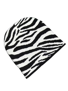 Detailed view of the black and white zebra pattern on the soft knitted beanie hat texture