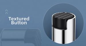 Detailed macro view of the non-slip grooved button on the glass oil sprayer bottle