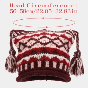 Detail view of Fair Isle knit beanie with size chart showing 56-58cm head circumference