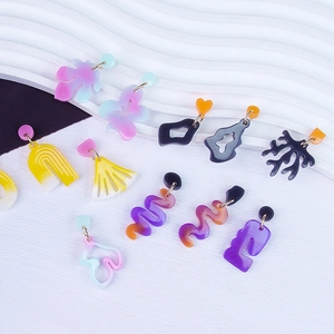 Assorted colorful DIY geometric resin earrings in various abstract shapes and textures