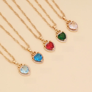 Detailed shot of heart crown pendants in five colors with golden twisted rope chains