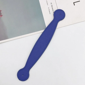 Detailed view of dark blue Saffiano leather wrist strap with fine stitching and round ends