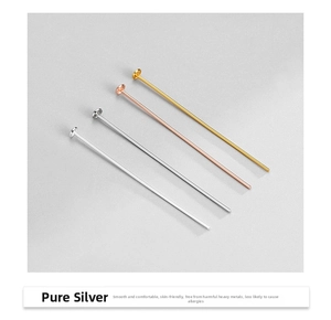 Macro shot of 925 sterling silver flat head pins in silver, rose gold, and gold plating