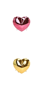 Vertical view of glossy heart-shaped acrylic evening clutch bags in pink and gold