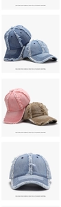 Detailed view of distressed edges and washed denim texture on a vintage baseball cap