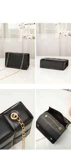 Detail view of the black quilted crossbody bag showing gold chain and checkered lining