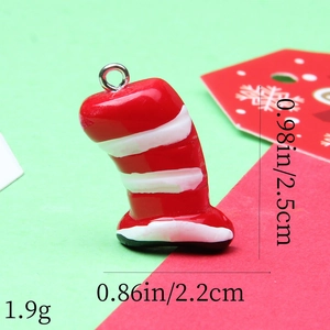Macro shot of striped Christmas resin hat pendant with specific size and weight data