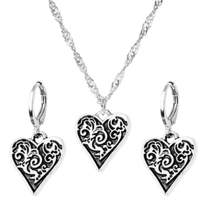 Vintage silver heart jewelry set with engraved vine patterns including necklace and earrings