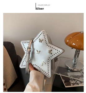 Silver star-shaped handbag with butterfly ornaments and rivet edges in y2k style