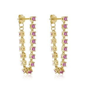 Detail of gold chain earrings with pink cubic zirconia stones on a white background