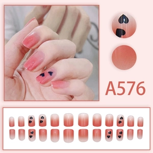 Short square pink gradient press-on nails with black heart patterns set of 24 pieces