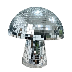 Sparkling silver mushroom disco ball decor with reflective mirrored tiles on white background
