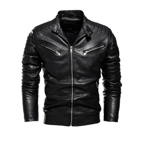 Detail of black faux leather jacket showing quilted stitching on shoulders and stand collar