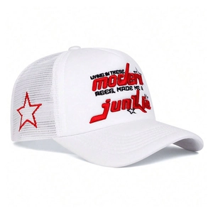 Detail of white trucker hat featuring red star embroidery and breathable mesh side panels